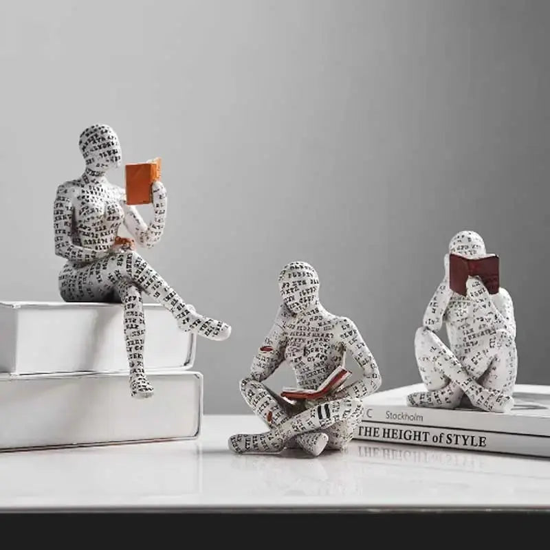 Escultura decorativa hora da leitura zafer decor