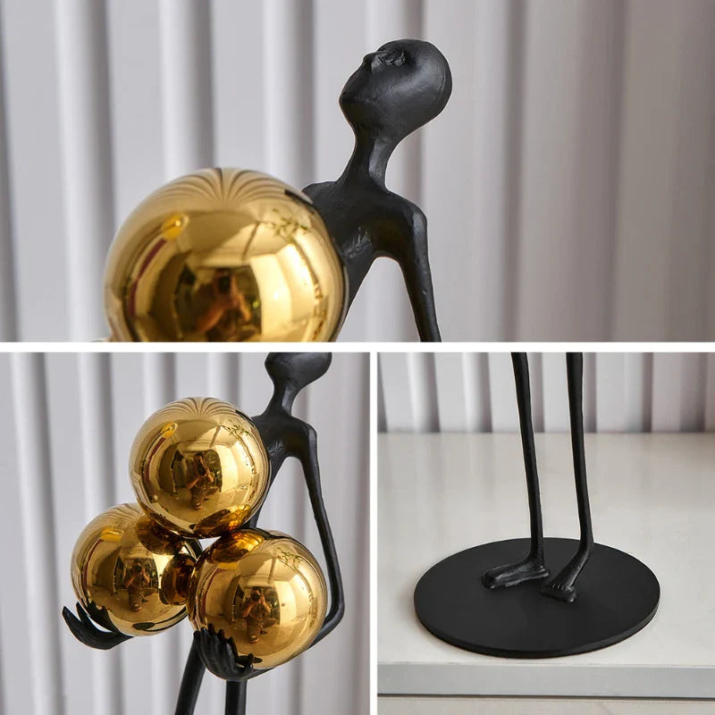 escultura minimalista elegante preta e dourado