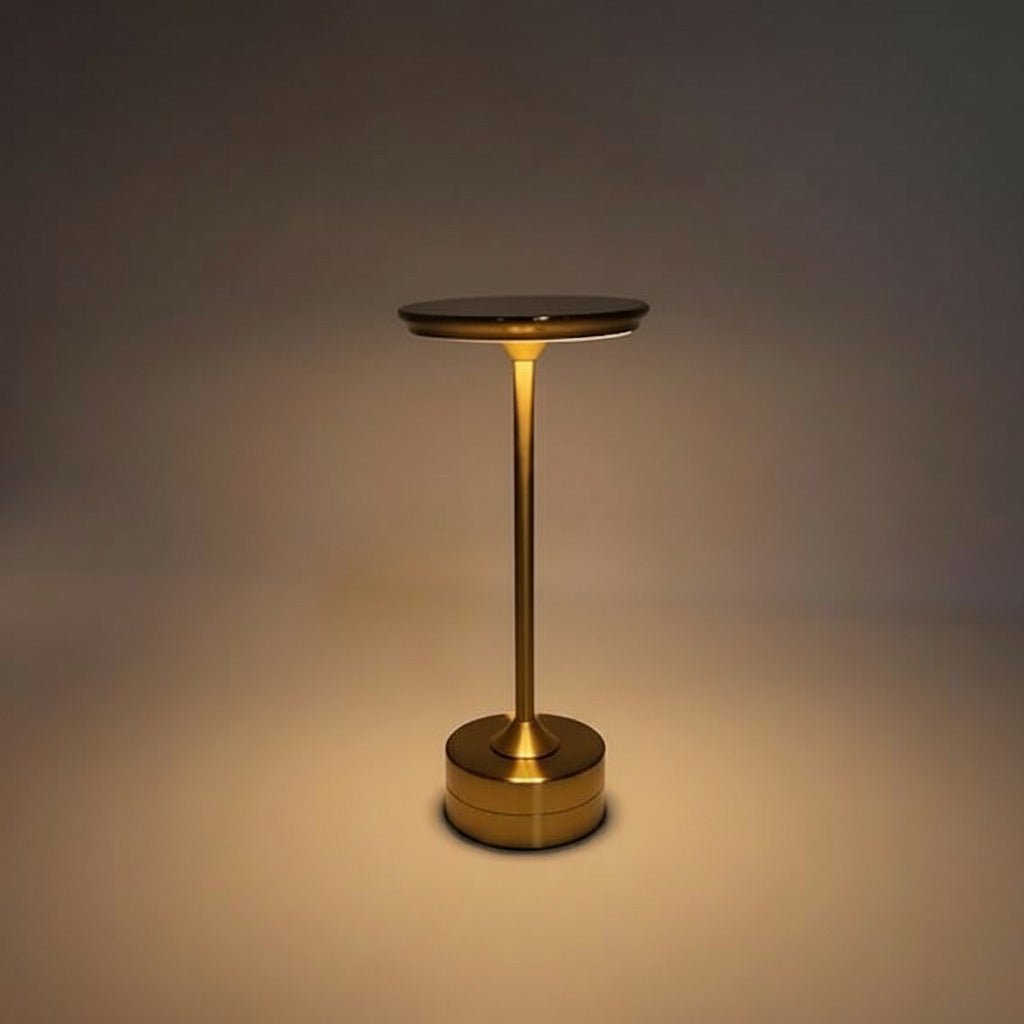 Luminária de mesa LED dourada com design moderno e luz quente